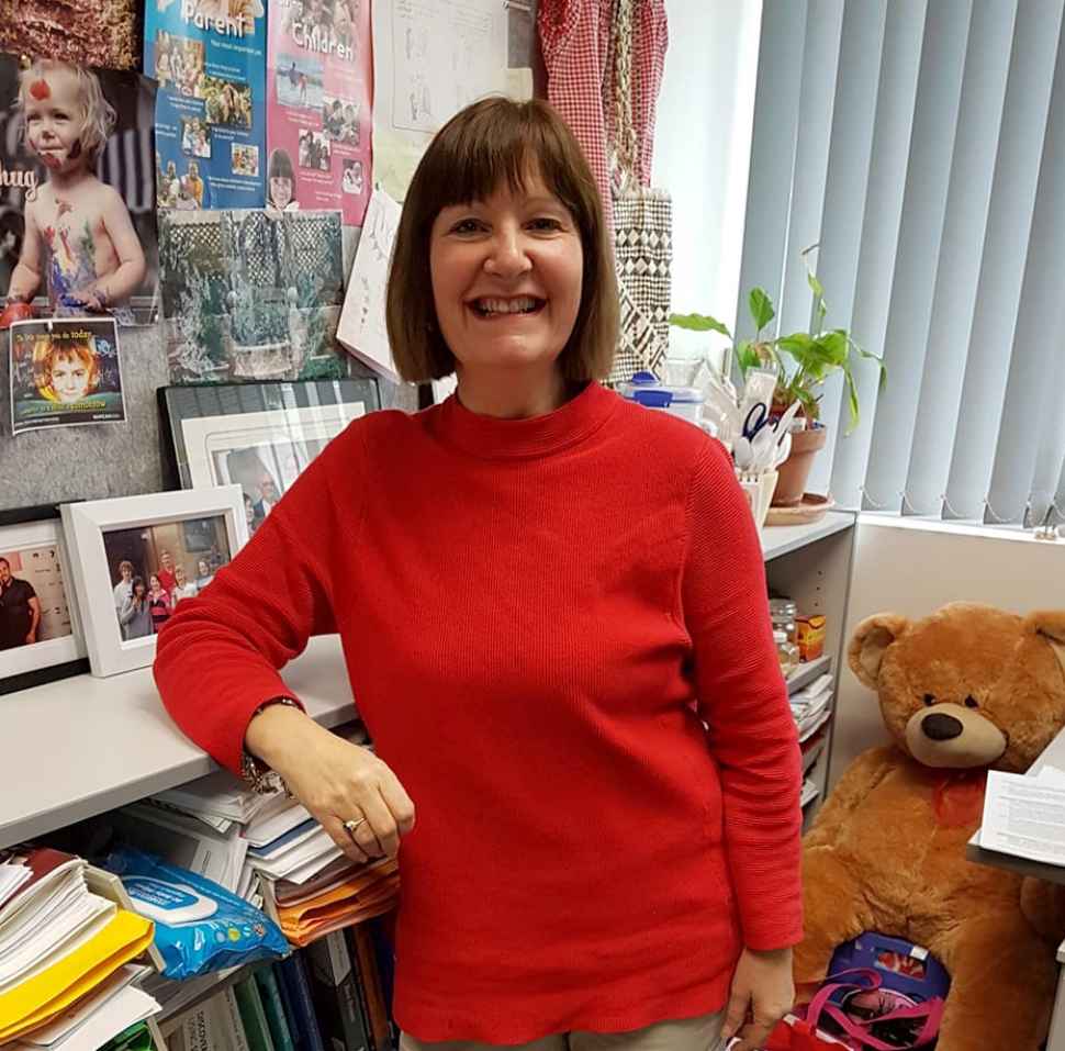 Dr Yvonne Parry smiling in her office