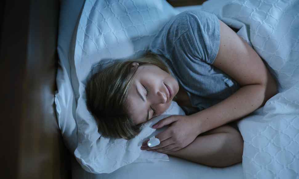 Woman sleeping in bed