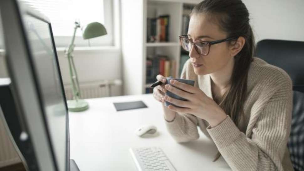 woman looking at computer